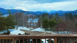 A mountain landscape with a building in the foreground. - Beautiful townhome w/ mountain views from the deck, near skiing (Bartlett)