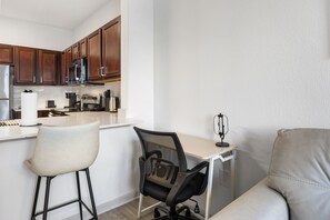 Fridge, microwave, oven, stovetop - Relaxing Getaway w/ Pool view + Gym (Frisco)