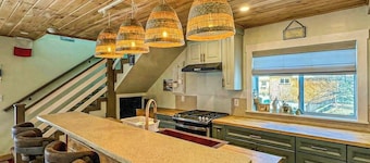 Spacious Kennebunk home with access to a pool, sauna, and outdoor balcony