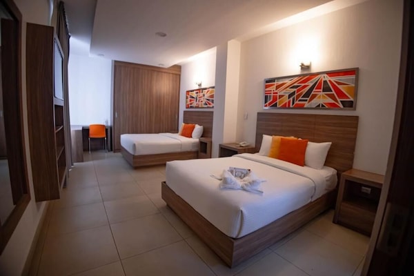Double Room, City View | Desk, blackout drapes, iron/ironing board, WiFi (free)