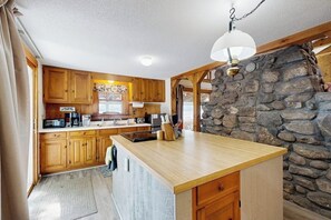 Fridge, microwave, oven, stovetop - Lakefront home with views, water access for boating & swimming (Freedom)