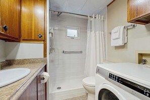 Shower, hair dryer, towels