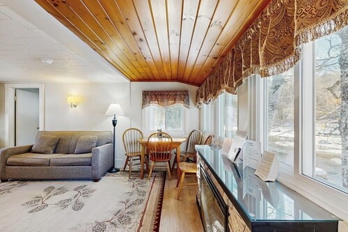 Cute Riverfront Cabin in Great Location w/ Shared Pool, Kitchenette, & Free WiFi
