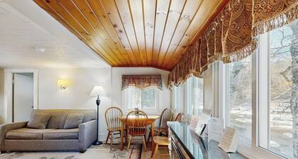 Cute Riverfront Cabin in Great Location w/ Shared Pool, Kitchenette, & Free WiFi