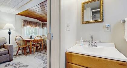 Cute Riverfront Cabin in Great Location w/ Shared Pool, Kitchenette, & Free WiFi
