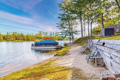 Stunning lakefront home with private dock, deck, firepit, and lake view