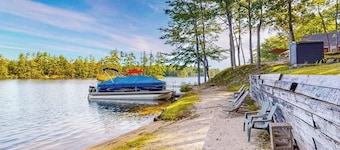 Stunning lakefront home with private dock, deck, firepit, and lake view