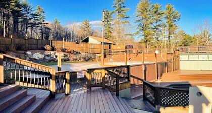 Dog-friendly mtn-view home with 2 hot tubs, pools, tennis, sandy pond, gym, BBQ