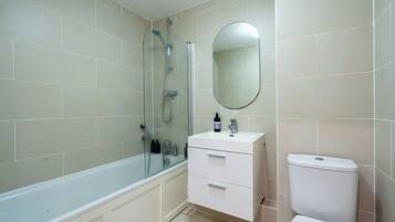 Hair dryer, towels, soap, shampoo