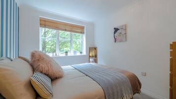 1 dormitorio, tabla de planchar con plancha, wifi gratis y ropa de cama