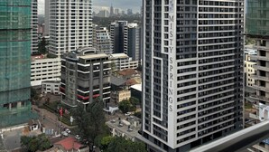 A high-rise building with 'GTC RESIDENCE' and 'MISTY SPRING' signage, surrounded by other buildings and construction sites. - 2-bedroom apartment on 18th floor in adorable Nairobi with fitness room access, (Nairobi)