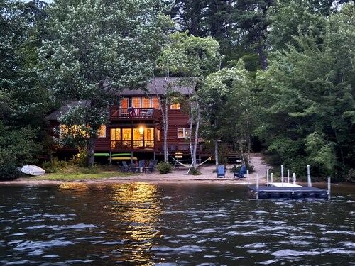 Lakeside home with private dock, firepit, grill, scenic balcony, fireplace & AC
