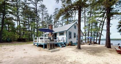 Secluded bayfront cottage with private beach, grill, & bay views