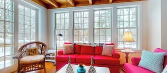 Picturesque creekside home with gorgeous deck & sunroom, near 4 ski mountains