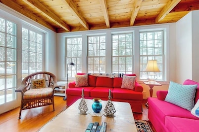 Picturesque creekside home with gorgeous deck & sunroom, near 4 ski mountains