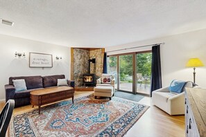 TV, fireplace - Mountain Townhome w/ pool access, private patio, walk to town (Waterville Valley)