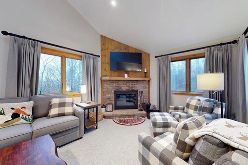 Ski-in/out condo with water & mountain views, private sauna & fireplace