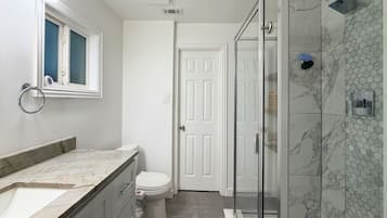 Shower, towels, soap, shampoo