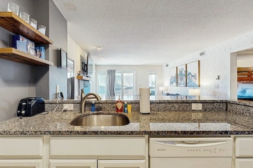 Ski-in/out mountainside condo w/ mountain views, private deck, fireplace, w/d