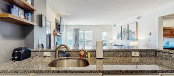 Ski-in/out mountainside condo w/ mountain views, private deck, fireplace, w/d
