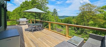 Elegant home w/ mountain views, trail to riverfront, hot tub, dog-friendly, bbq