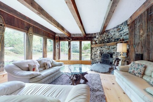 Unique & quaint home with loads of character, firepit, two wood stoves, & grill