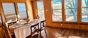 A spacious vintage cabin with 6 bedrooms and 2.5 bathrooms.