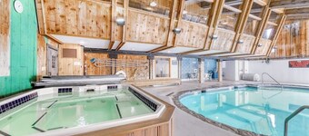 Classic Vermont cabin with forest views, pools, hot tub & gym