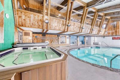 Classic Vermont cabin with forest views, pools, hot tub & gym