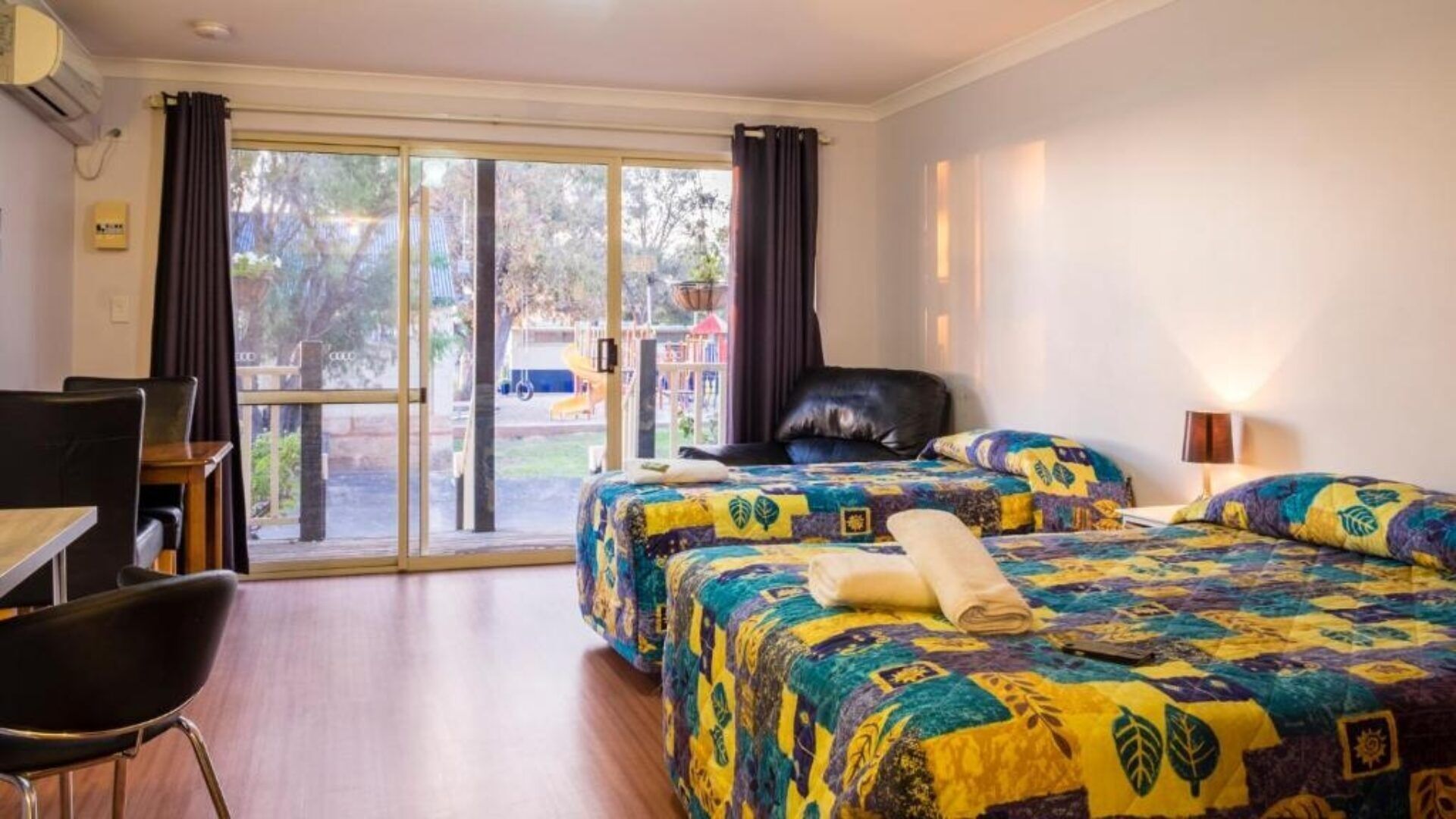 Standard Balcony Motel | Iron/ironing board, bed sheets