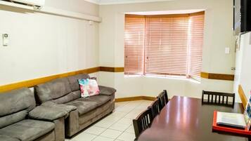 Standard Room, Patio, Sea View | Living area