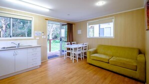 Standard Garden View 1 Bedroom Cabin | Living area