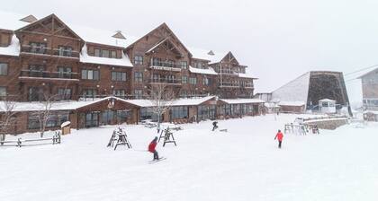 Ski-in/ski-out Dual-condo getaway w/mountain views, fireplace