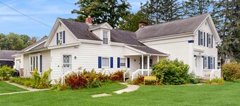 Charming two-story duplex with a full kitchen & grassy yard - near Mallets Bay