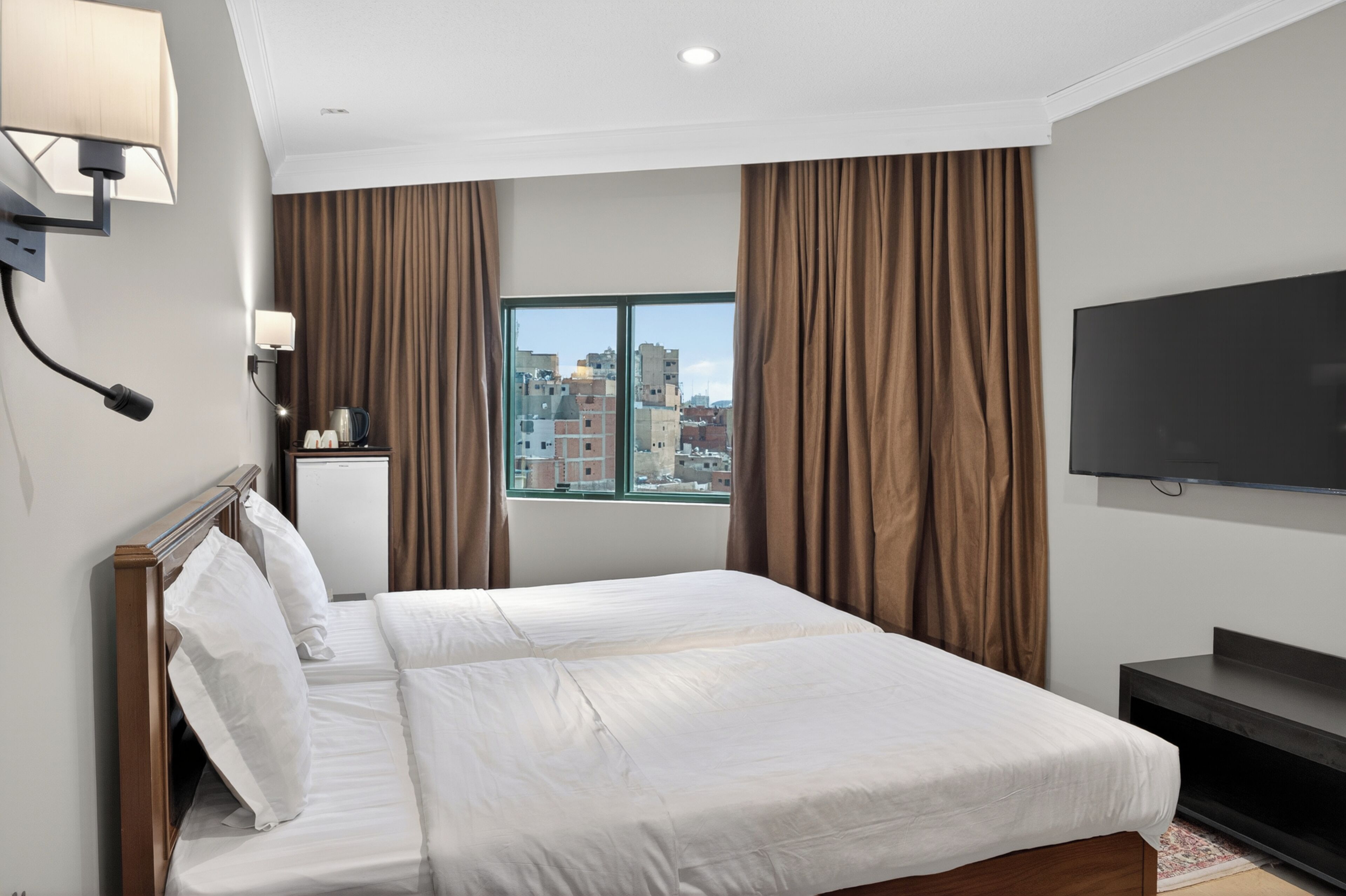 Chambre Deluxe Double ou avec lits jumeaux, vue ville | Bureau, espace de travail pour ordinateur portable, Wi-Fi gratuit