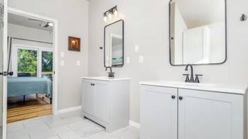 Hair dryer, towels, soap, shampoo