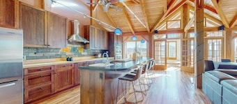 Private mountain retreat with a game room, home theater, & jetted tub