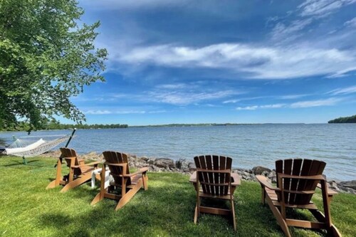 Lakefront retreat with kayak, dock, Adirondack chairs, & stellar views - dogs ok