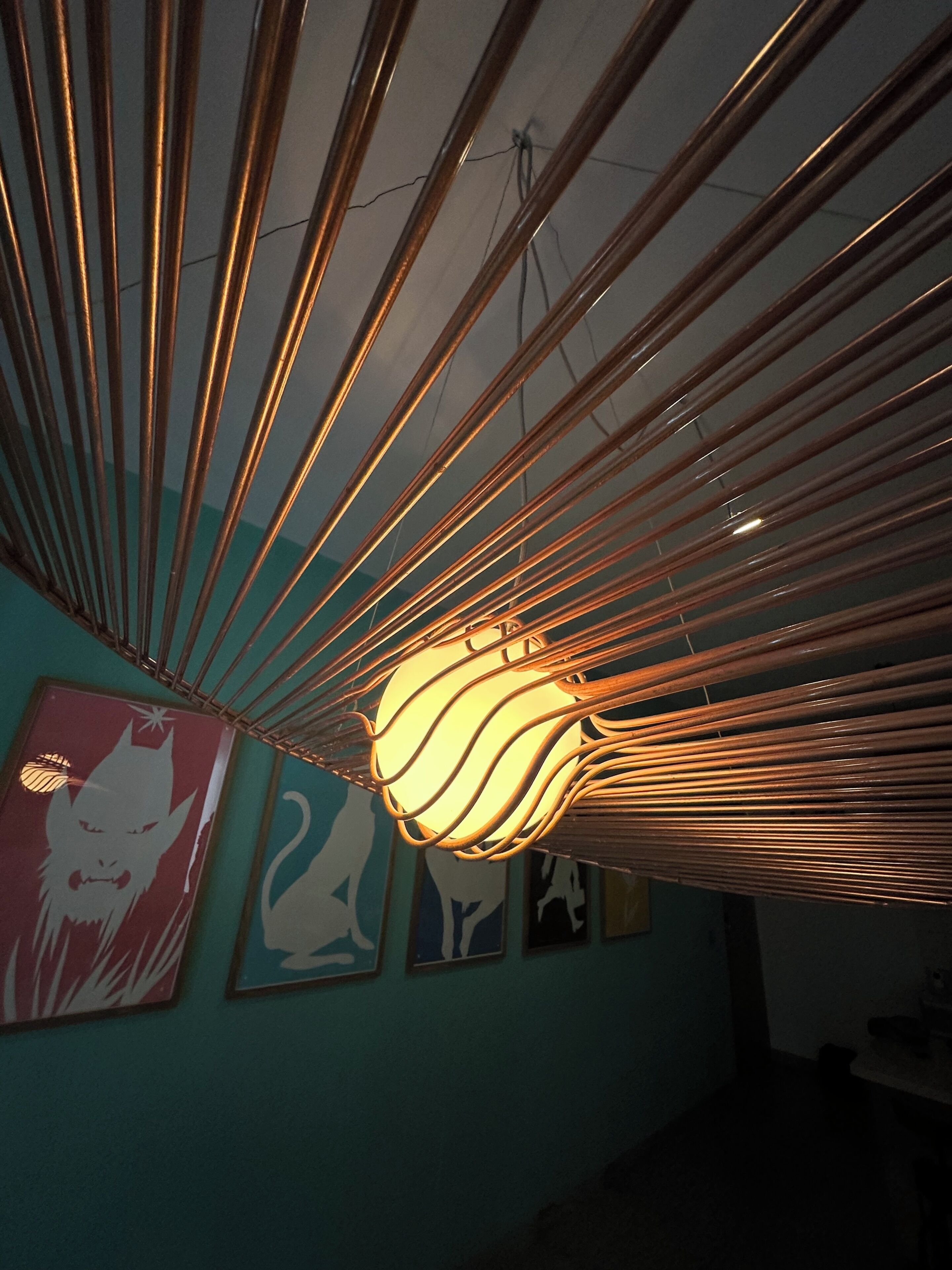 A ceiling with parallel lines and a central light fixture.
