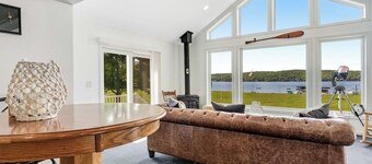 Dog-friendly lake escape with sunroom, high-speed WiFi, water views & central AC