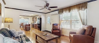 Riverfront, dog-friendly, mountain views, a/c, deck, ski nearby, gas stove, w/d