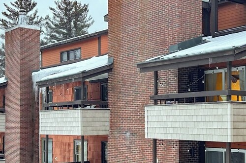 Ski getaway with pool, sauna, covered balcony, W/D access, & internet