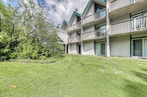 Ski-in/out condo with pool, hot tub, game room, mountain view, & fireplace