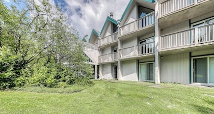 Ski-in/out condo with pool, hot tub, game room, mountain view, & fireplace