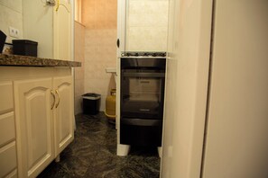 Private kitchen - Florida in Guarujá. Cozy apartment with ocean view. Pets allowed! (Guarujá)