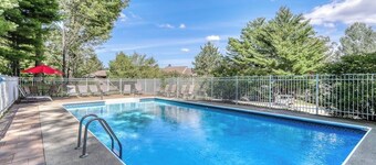 Picturesque mountain view condo with fireplace, balcony, deck, pool, & kitchen