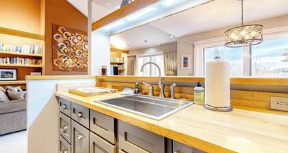 Ski-in/out condo steps from the lifts/village with fireplace & mountain views