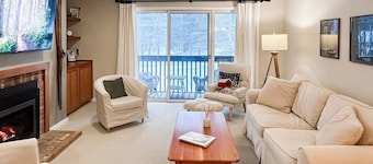 Top floor condo w/ balcony, gas fireplace, tennis, walking/biking trails, w/d
