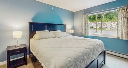 Ski-in/ski-out ground floor condo near slopes, balcony, fireplace, pool, wifi