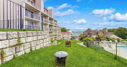 Ski-in/ski-out ground floor condo near slopes, balcony, fireplace, pool, wifi